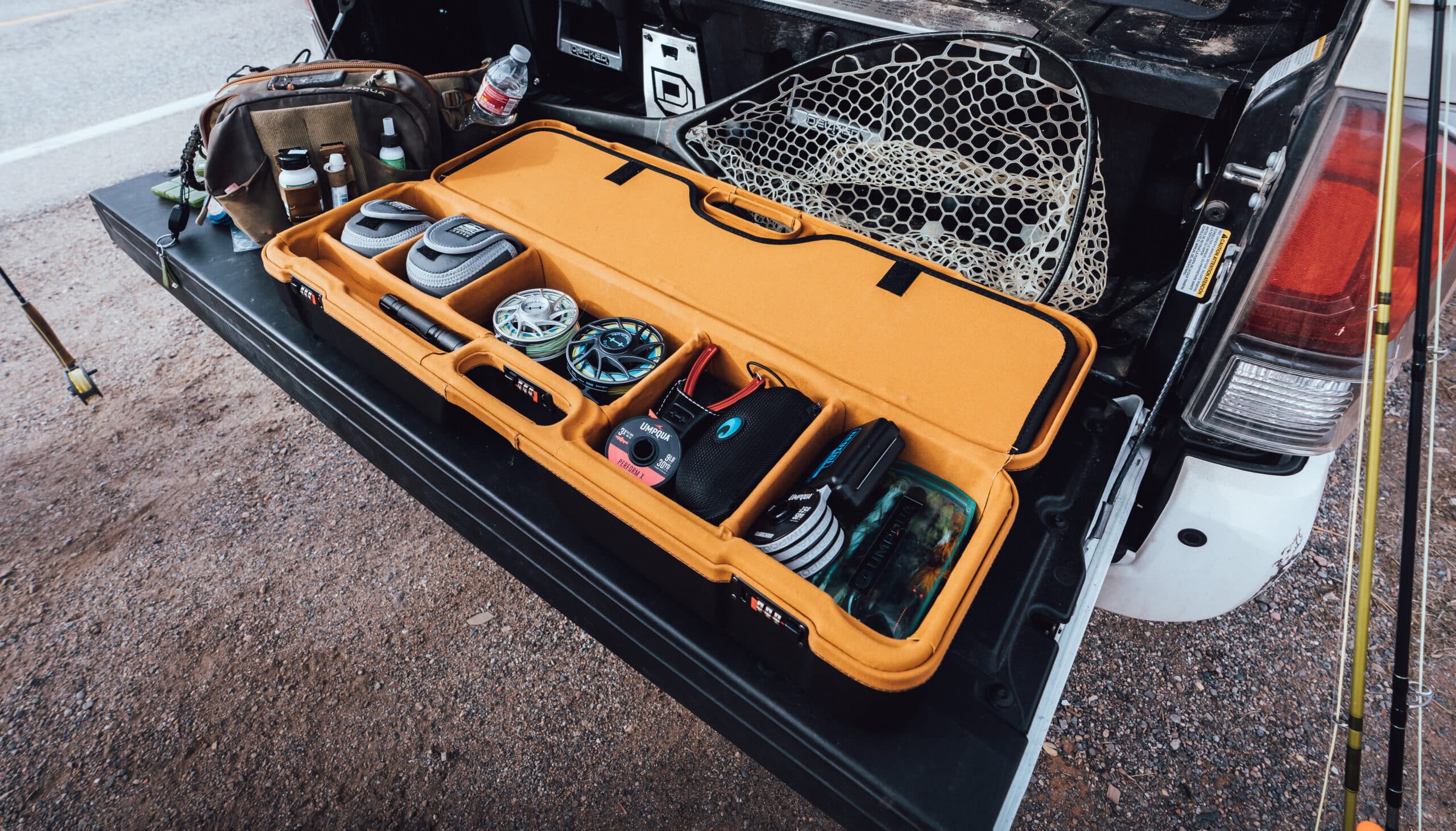 Sea Run Fly Rod and Reel Case loaded up on truck tailgate